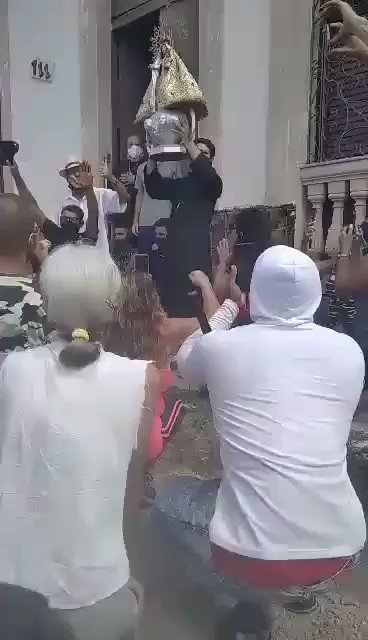 South of Havana, in Bejucal, the townspeople bring out la Virgen de la Caridad, the Patroness of Cuba, as the people shout, Liberty. Liberty. Liberty