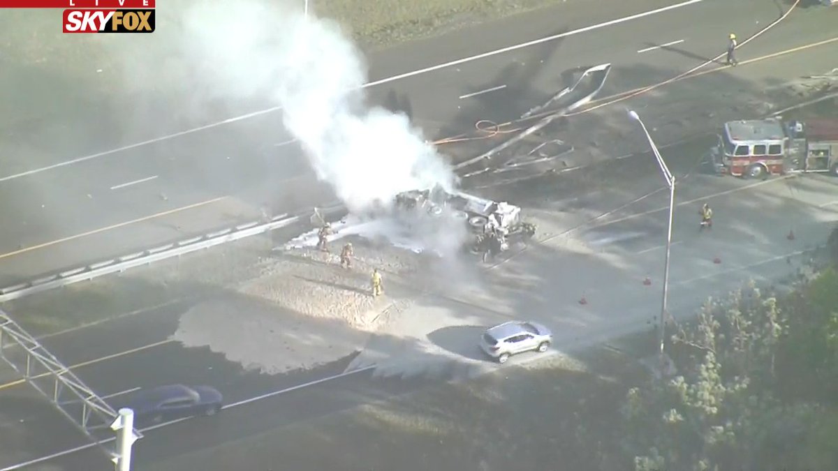 Vehicle fire on SR-408 at the Florida Turnpike. Lanes blocked in both directions. Cars using the shoulders to get around this. Use caution