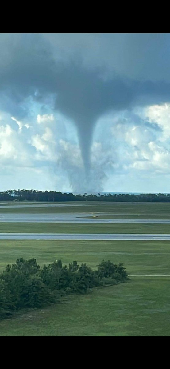 Another shot of the waterspout over Pensacola Pass from NAS Pensacola this morning (around 8:15 AM)