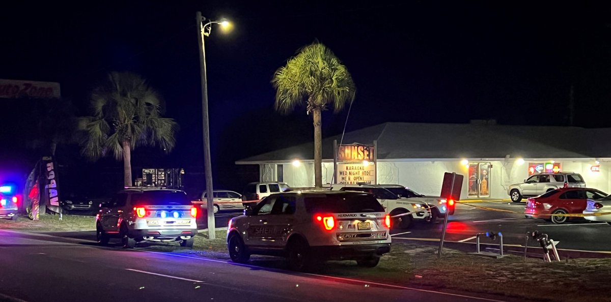 Is investigating a shooting of two individuals in the area of the Sunset Lounge located at 5429 Spring Hill Drive in Spring Hill. The shooting occurred shortly before 1:30am and appeared to be the result of a bar fight