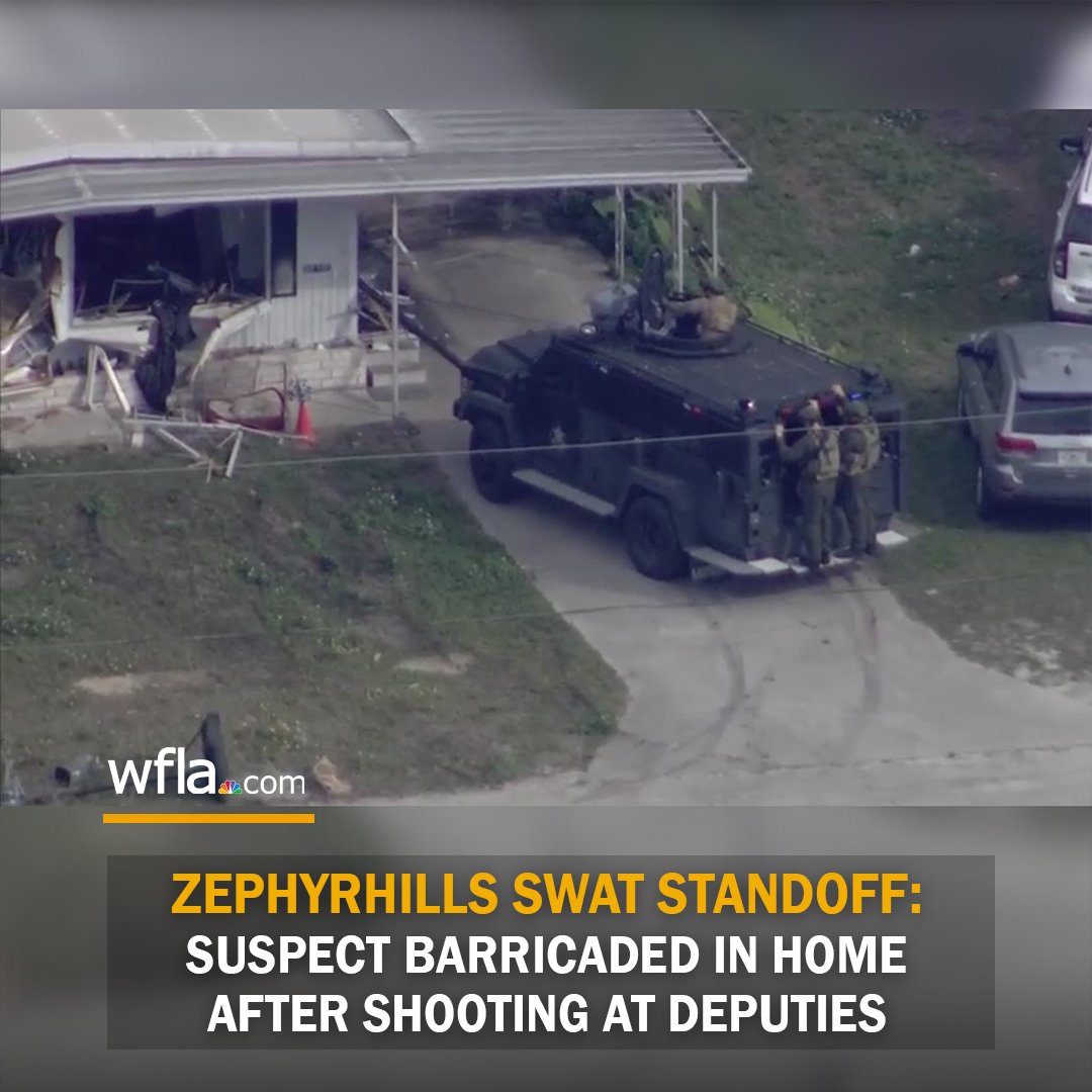 SWAT teams surrounded a Zephyrhills home after a suspect exchanged gunfire with deputies, the Pasco County sheriff's office says