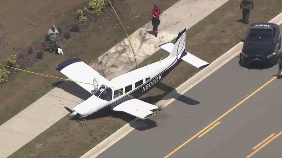 PLANE CRASH: Two people were aboard a small plane that crashed along the side of the road in Florida Wednesday morning