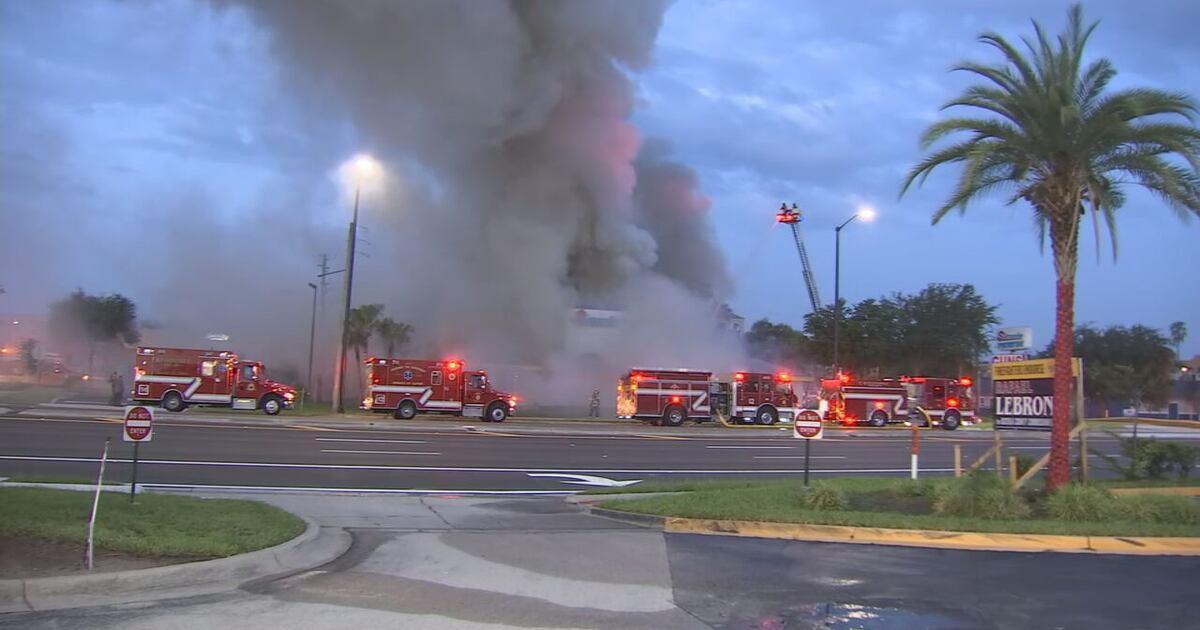 Massive fire destroys Kissimmee pawn shop, 45 firefighters battle blaze on Vine Street