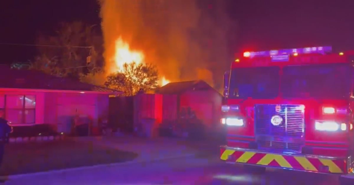 Neighbors react to fire that destroyed a Lake City home